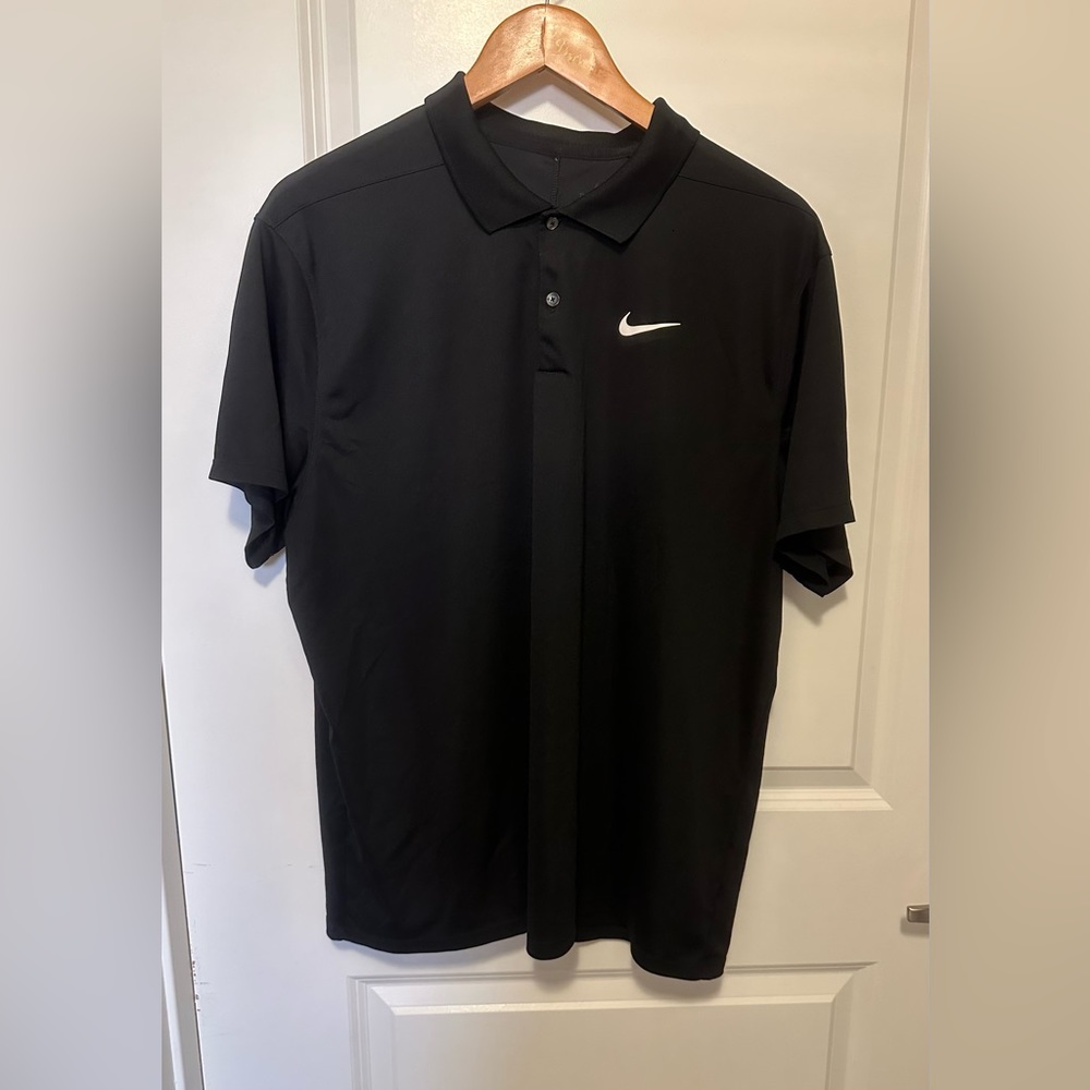 Nike men’s XL black performance polo shirt. Excellent condition